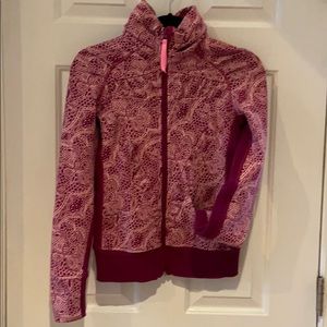 Ivivva light weight zip up jacket.